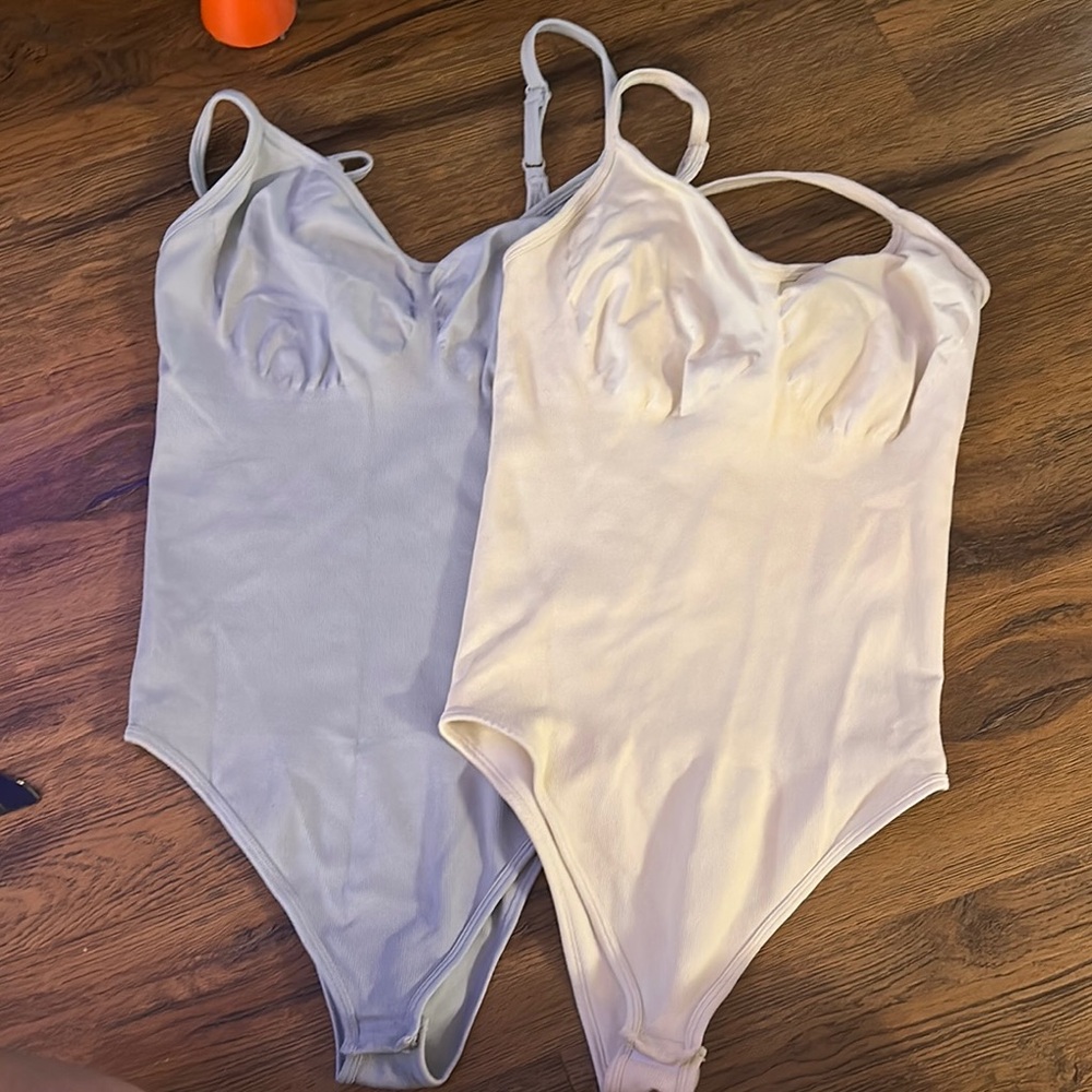 Elegant Cream and Blue Bodysuits